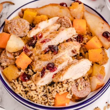 braised chicken sliced with butternut squash and cranberries