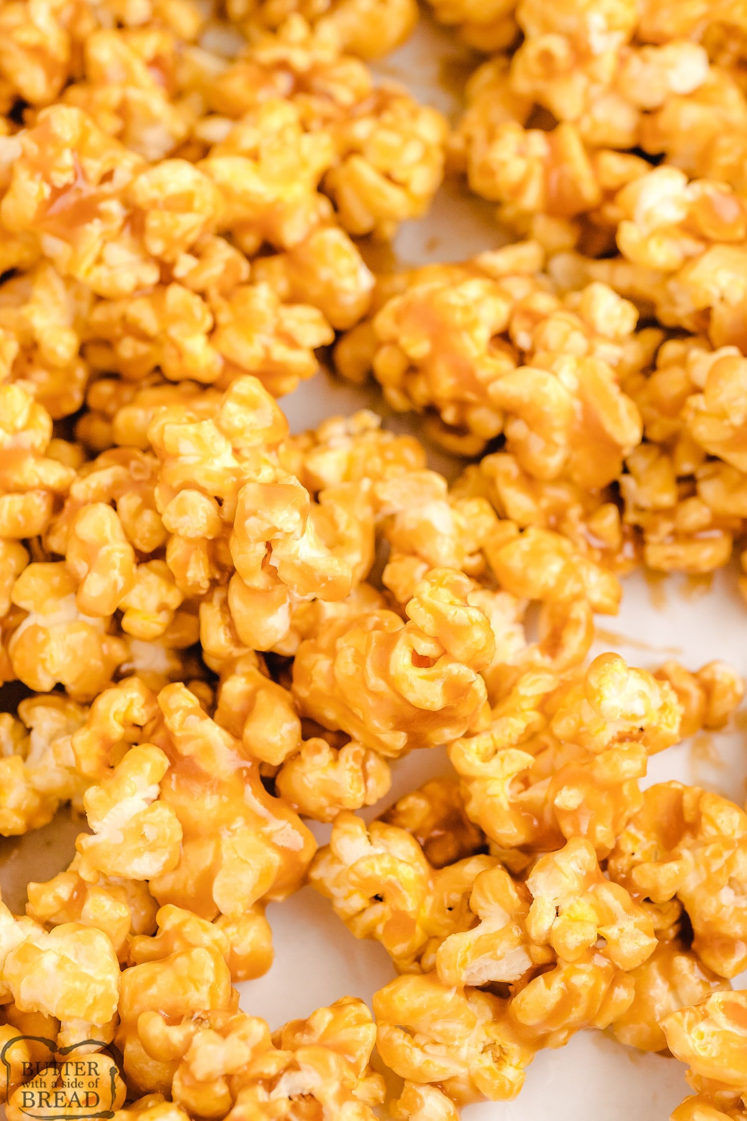 caramel popcorn cooling on wax paper