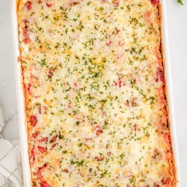 best homemade classic lasagna in a white casserole dish