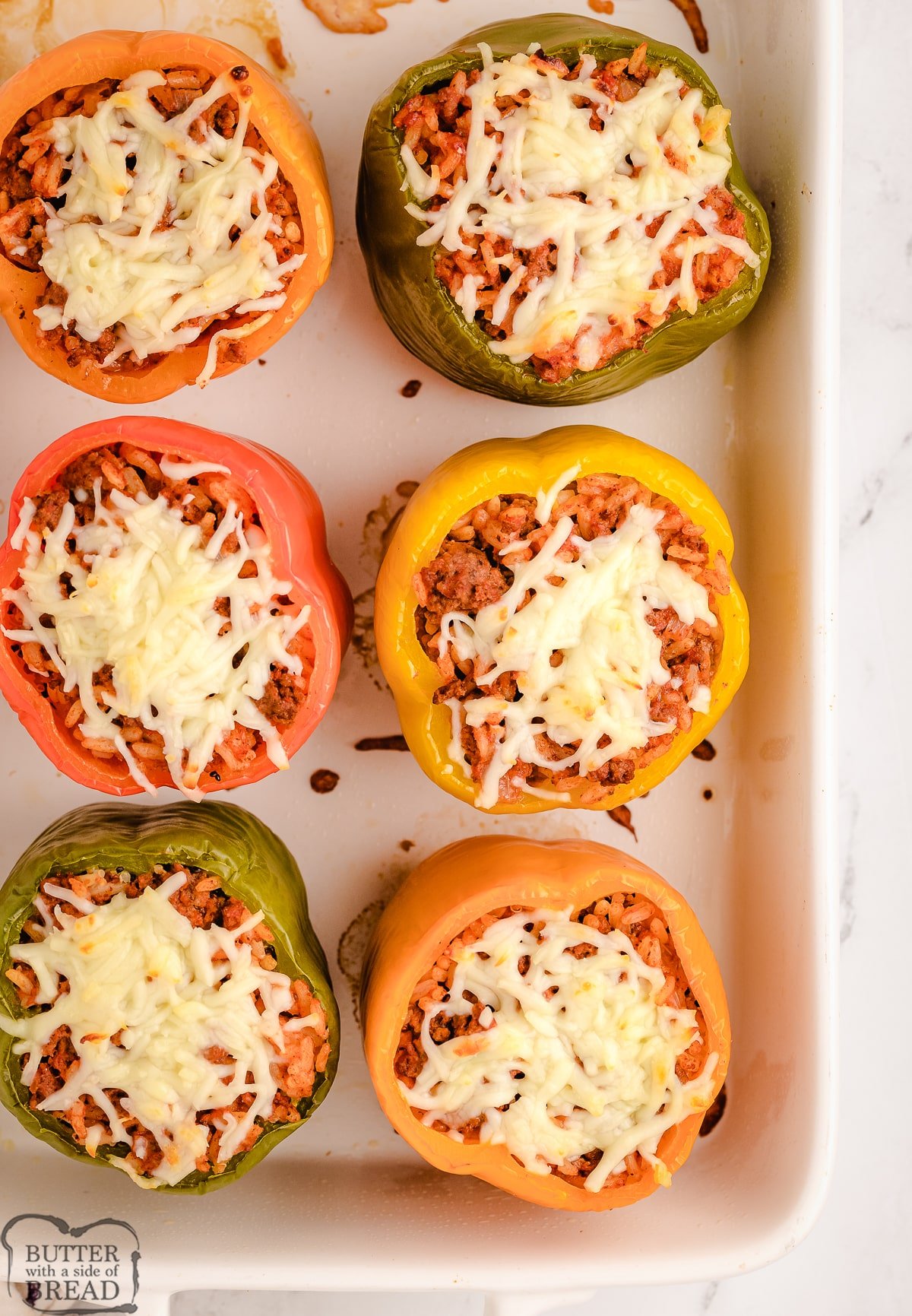stuffed bell peppers with mozzarella cheese on top