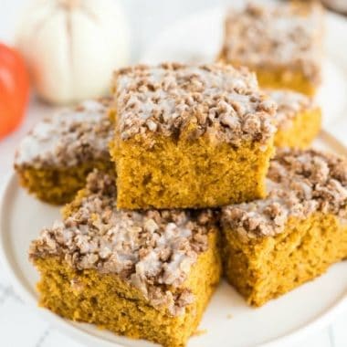 Pumpkin breakfast cake is a delicious morning treat! Easy Pumpkin cake, streusel topping and glaze poured over the top, you'll definitely want to keep this recipe! 