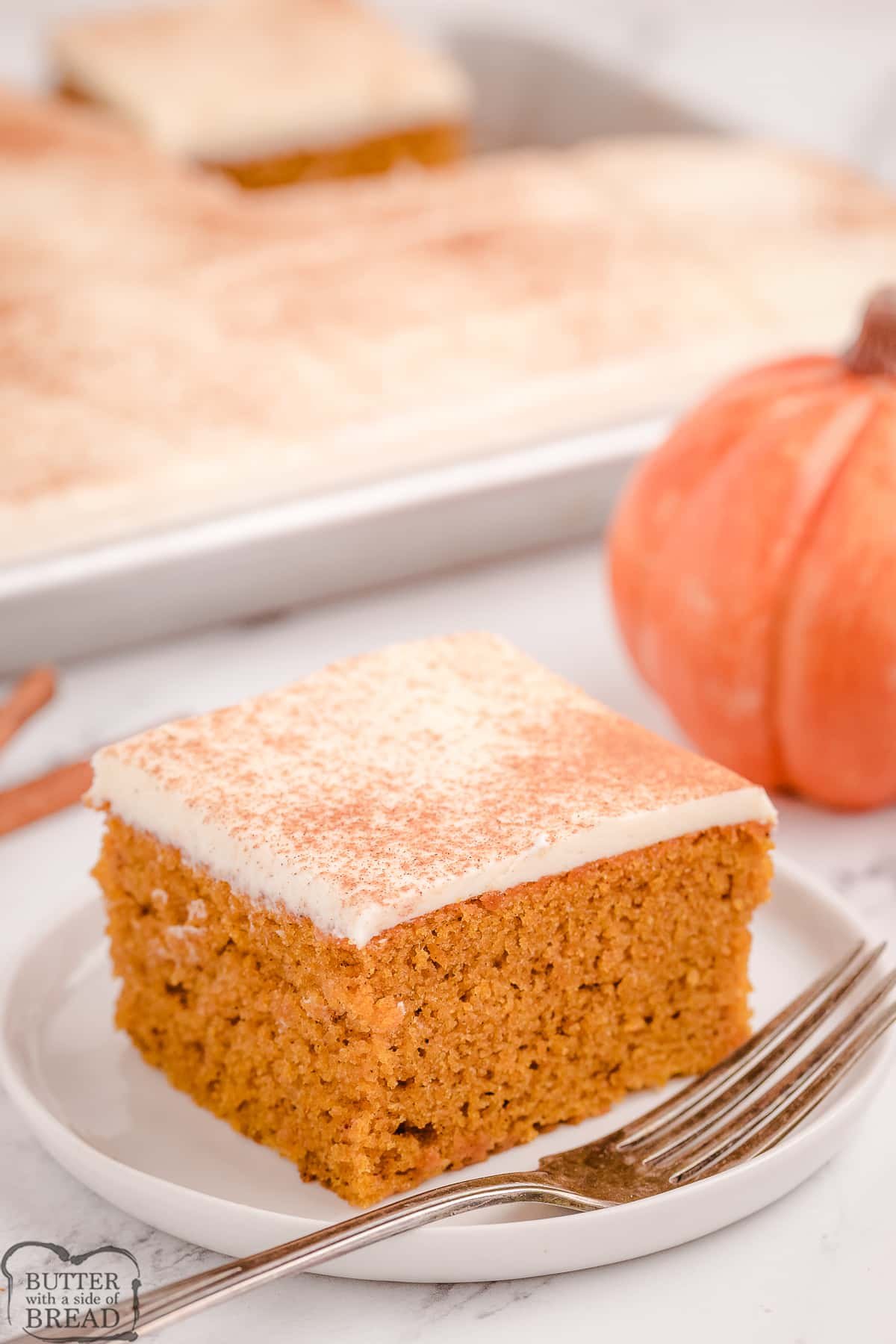 sheet pan with frosted pumpkin bars 
