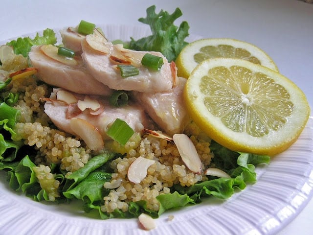 Tangy sweet lemon chicken served over a bed of rice and fresh leafy green lettuce sounds like a spring/summer dish if I ever heard one!