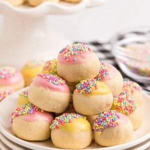 Italian cookies with frosting are perfectly sweet and tender cookies with a simple vanilla glaze. Lovely Italian Cookies topped with a sweet glaze and colorful sprinkles for any occasion!