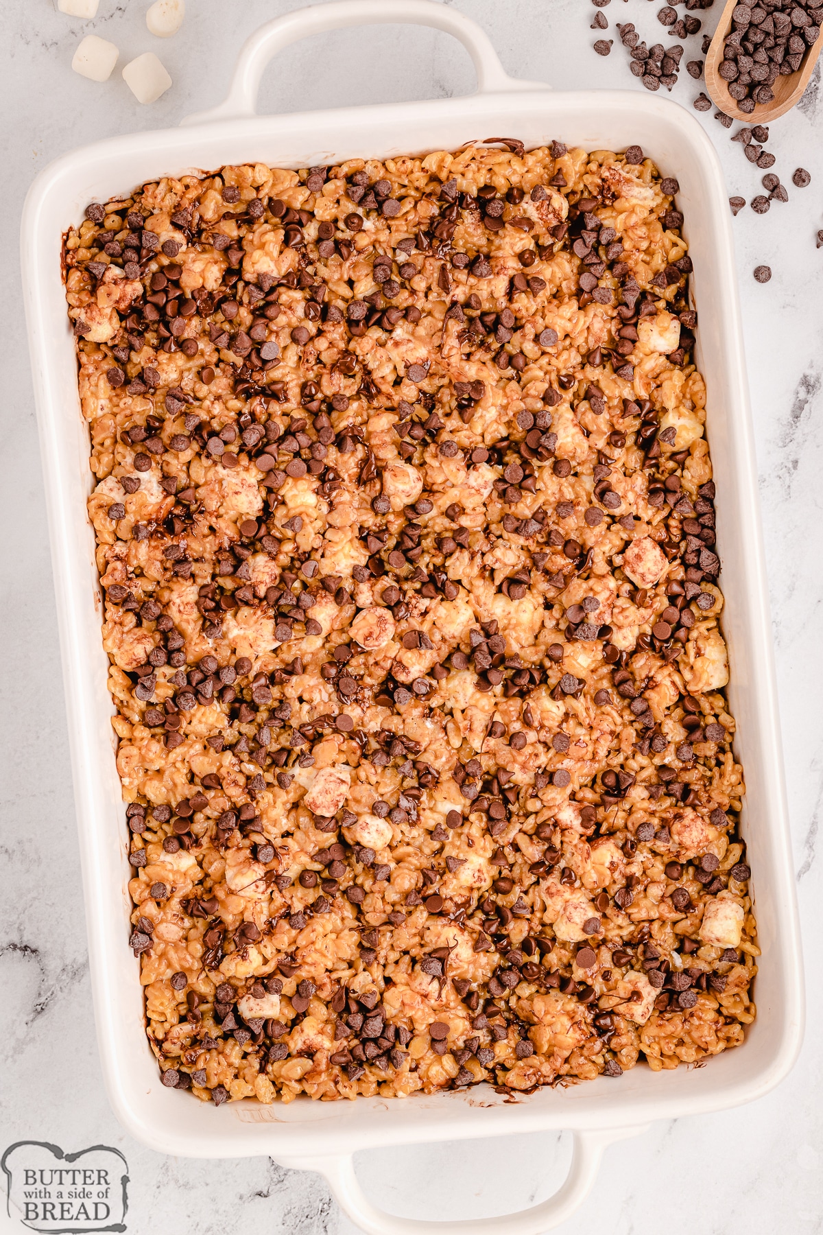 tray of rice krispie treats with peanut butter and chocolate chips