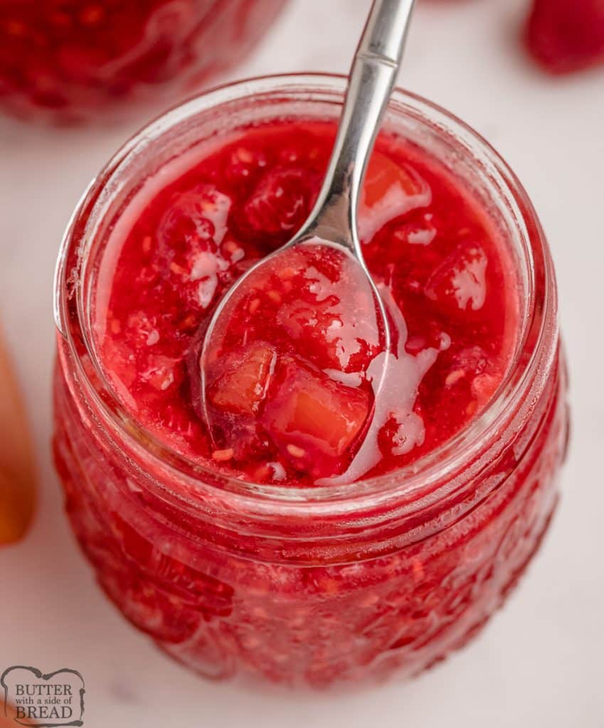 making freezer jam with raspberries and peaches