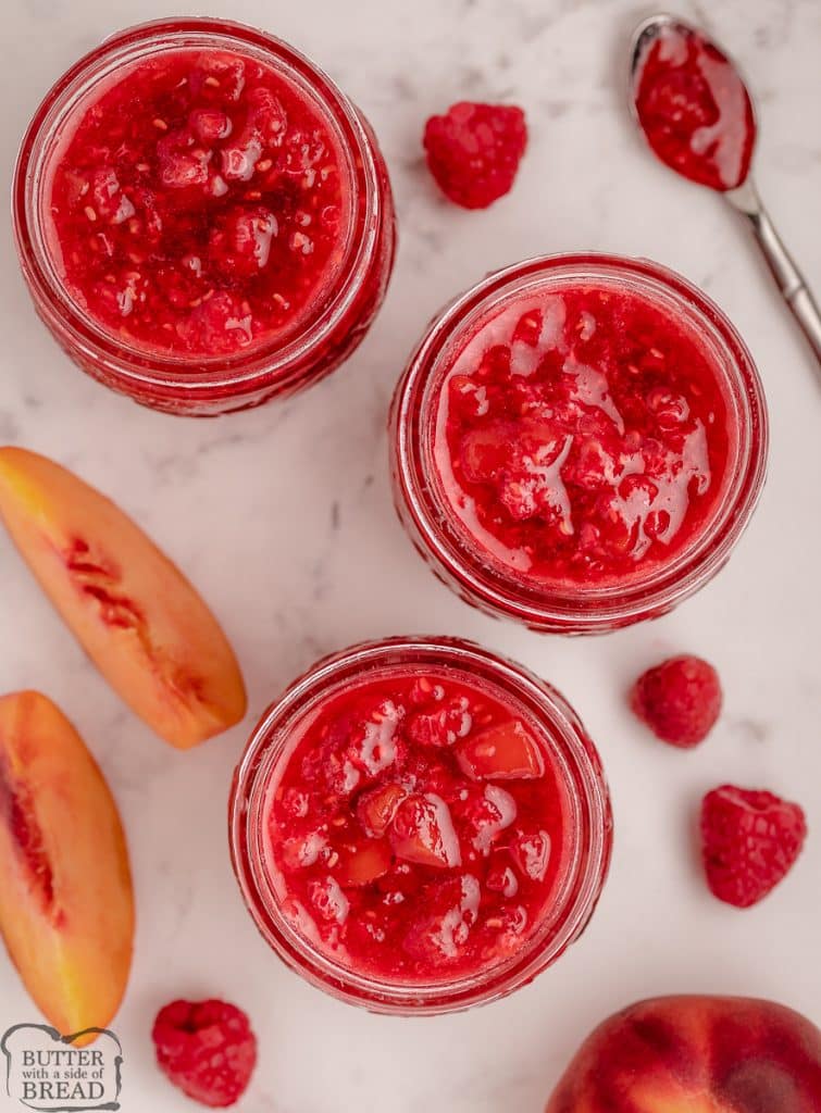 jars of homemade raspberry peach freezer jam