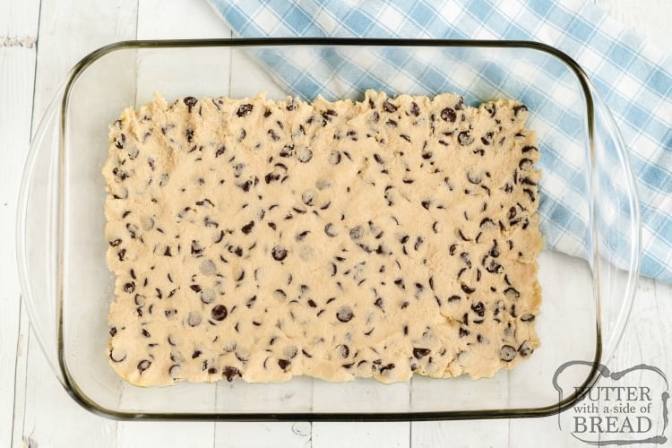 Bottom layer of cookie dough in pan