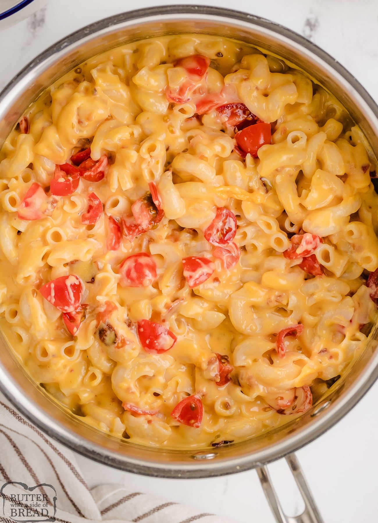 tomato bacon mac and cheese in a saucepan