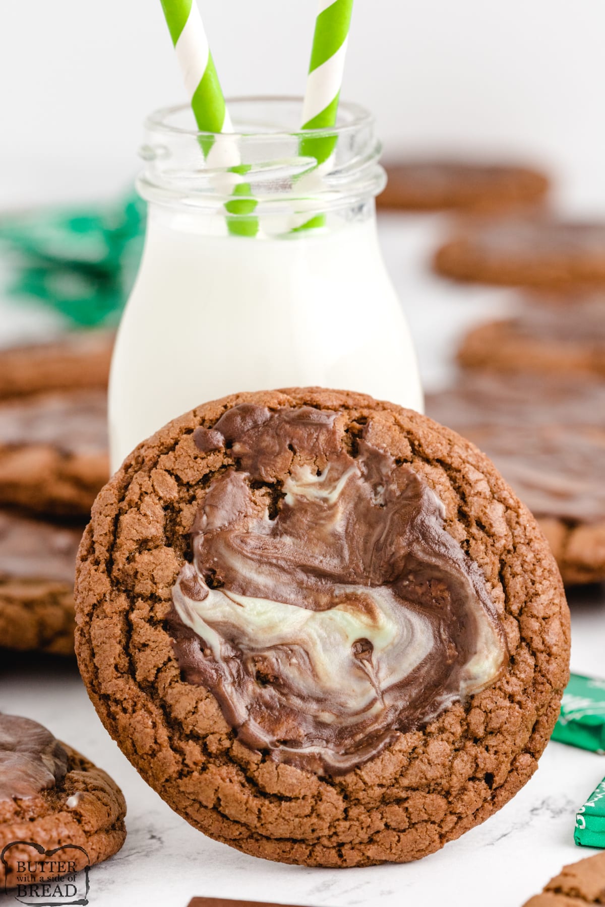 Mint chocolate cookie with glass of milk.