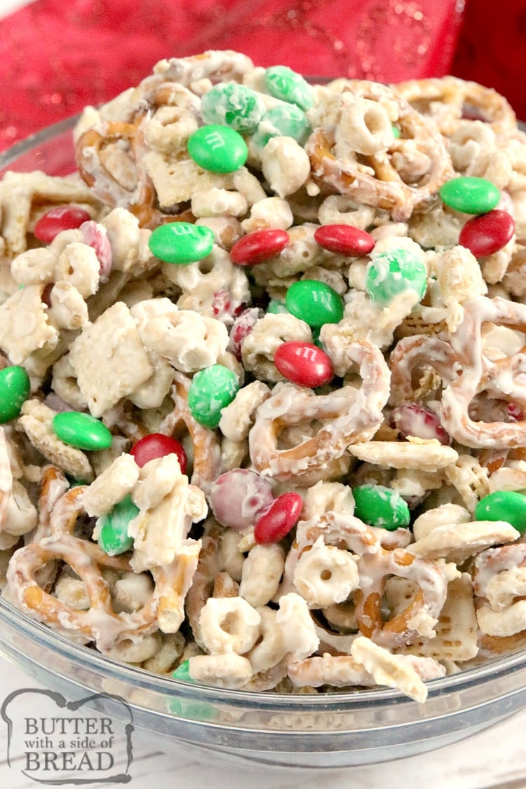 White Chocolate Chex Mix is made with cereal, pretzels, peanuts and M&Ms all coated in white chocolate. This easy chex mix recipe is salty and sweet and comes together in less than 5 minutes!