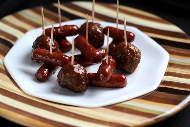 Meatballs & Smokies are the PERFECT game day appetizers! Whether your team wins or not, these meatballs & smokies (in an AMAZING sauce) will be a huge hit!