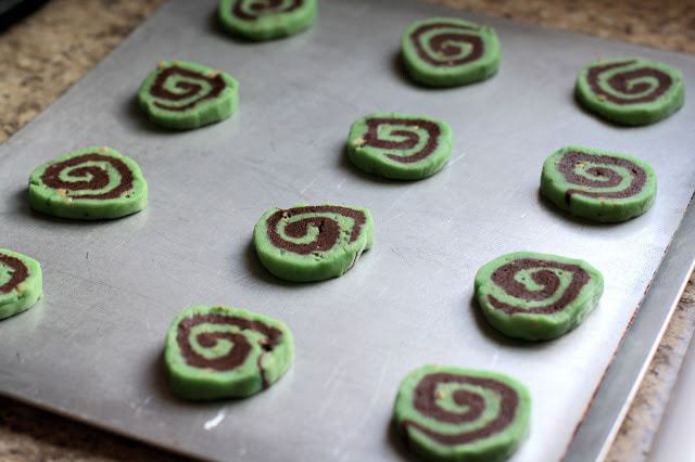 Chocolate Pistachio Pinwheel Cookies combine chocolate and pistachio flavors into a simple, but delicious and impressive cookie recipe that is perfect for St. Patrick's Day! 