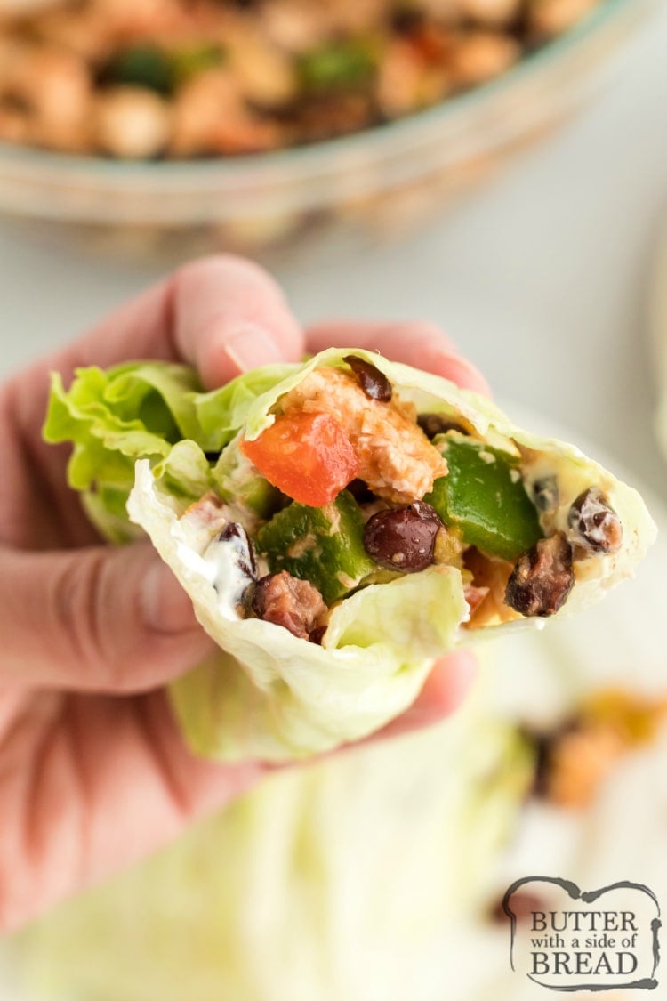 Mexican Chicken Lettuce Wraps are full of chicken, black beans and tons of flavor. These delicious high-protein, low-carb lettuce wraps are healthy and delicious and can be served as an appetizer or as a main dish. 