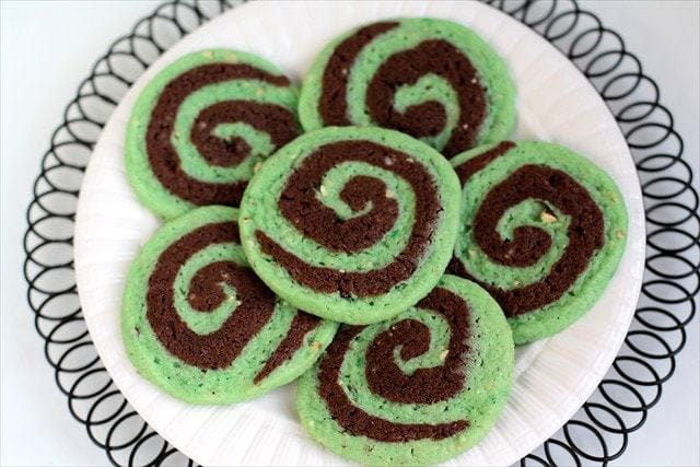 Chocolate Pistachio Pinwheel Cookies combine chocolate and pistachio flavors into a simple, but delicious and impressive cookie recipe that is perfect for St. Patrick's Day! 