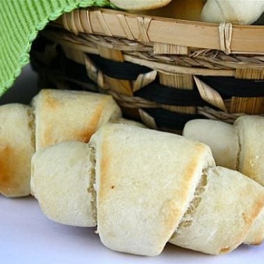 Quick and Easy Dinner Rolls can be made without a mixer in 30 minutes from start to finish and they are soft, fluffy and delicious! I'll never need another roll recipe again!