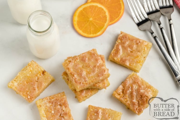 Glazed Orange Brownies are full of orange flavor in a soft and chewy dessert bar recipe. These orange brownies are even more delicious with a simple orange glaze on top! 