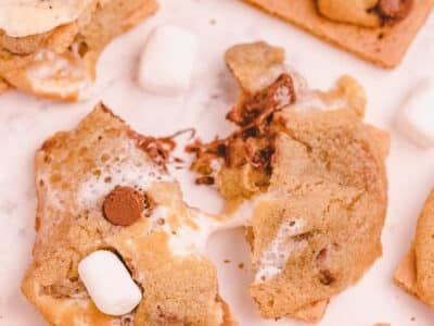 chocolate chip smores cookie baked on a graham cracker
