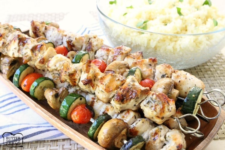 Greek Chicken Souvlaki grilled to perfection and served with Greek lemon rice. Best recipe for Greek Chicken Kabobs ever! Perfect weeknight dinner for anyone who loves the fresh, bright flavors of Greek food.