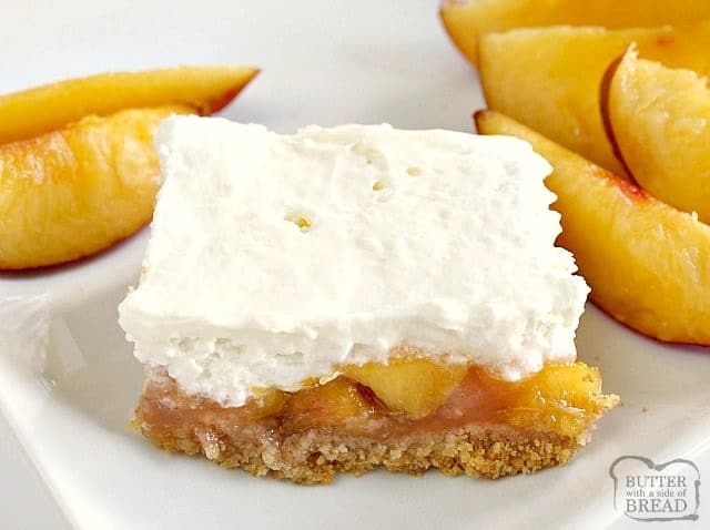 No-Bake Peaches & Cream Bars are one of my favorite fresh peach dessert recipes! Made with peach jello, cream cheese, graham crackers and of course, fresh & juicy peaches!