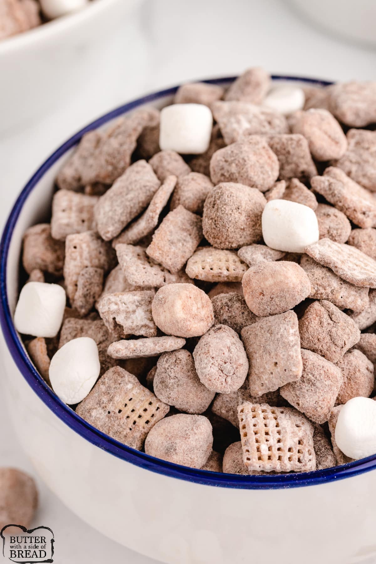 Hot Chocolate Snack Mix is made with Chex cereal, hot chocolate mix, marshmallows, and graham crackers! A fun variation on the traditional muddy buddies recipe. 