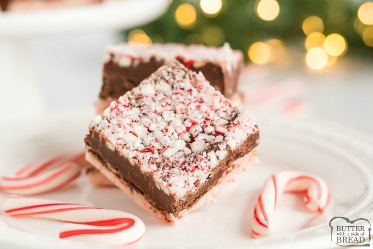 Candy Cane Fudge has a white chocolate peppermint layer on the bottom, a creamy fudge layer in the middle and crushed candy canes on top.  This easy peppermint fudge recipe is easily made in the microwave with only 6 ingredients!