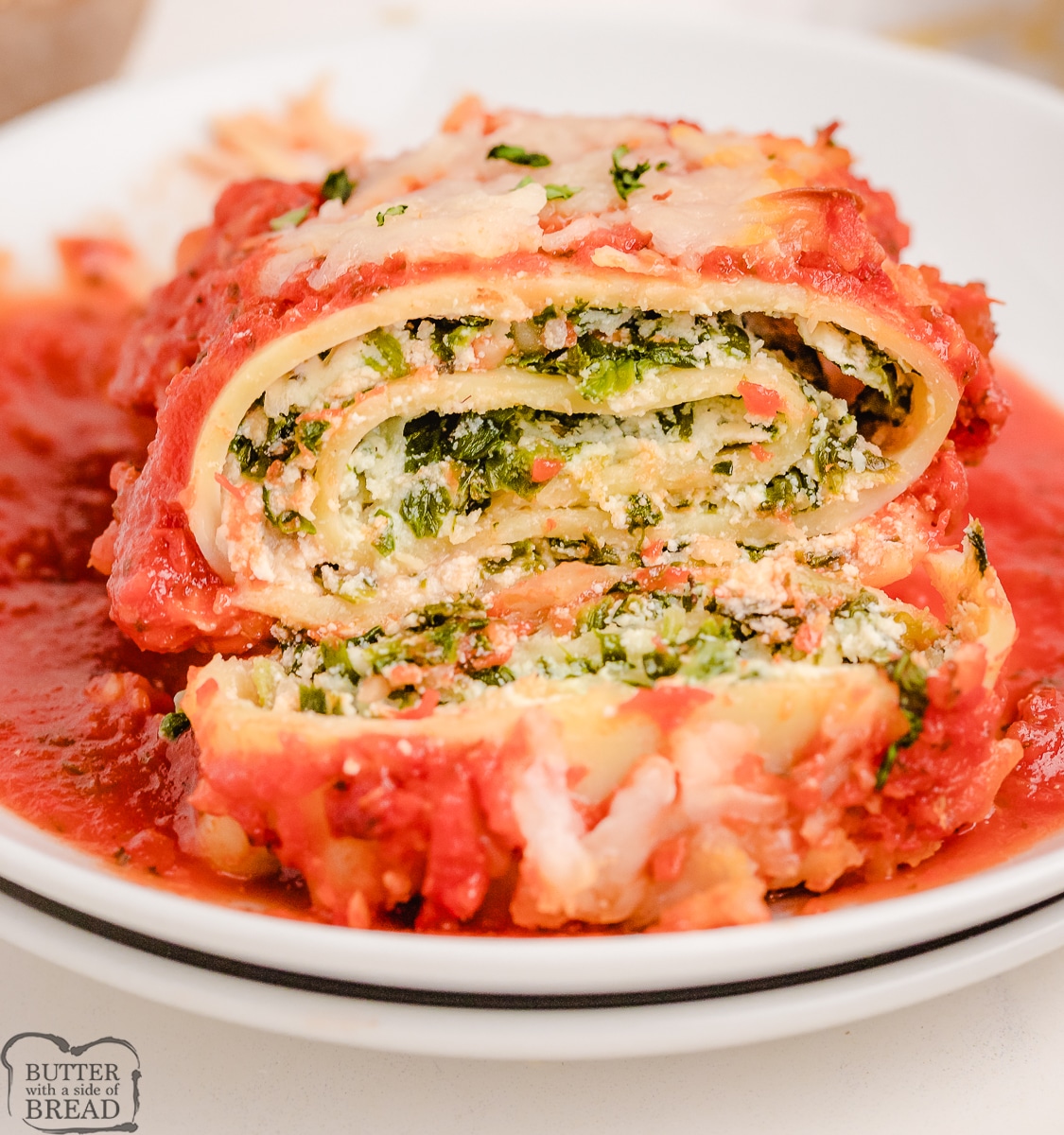 spinach lasagna roll sliced in half