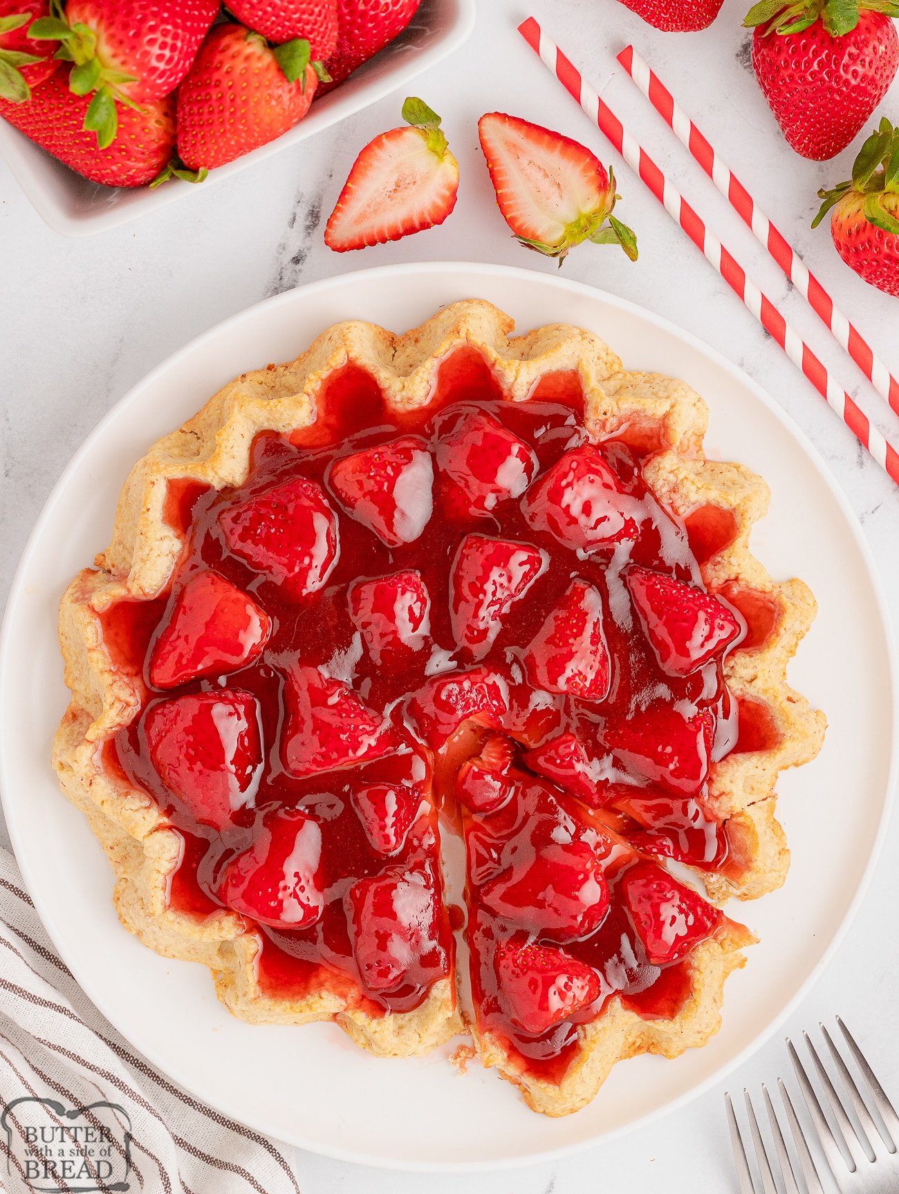 serving up a slice of strawberry tart
