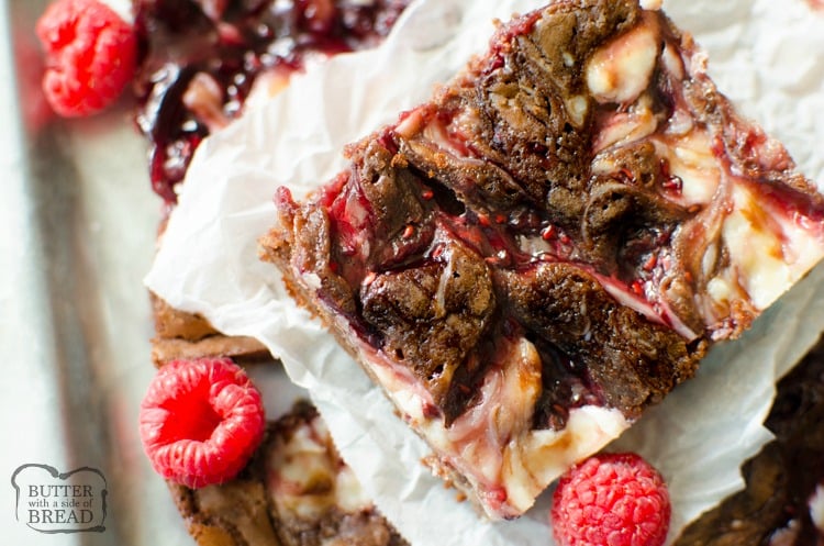 Raspberry Cheesecake Brownies are decedent 5 ingredient brownies with a raspberry cheesecake swirl. Quick & easy raspberry cheesecake brownie recipe that looks and tastes incredible!