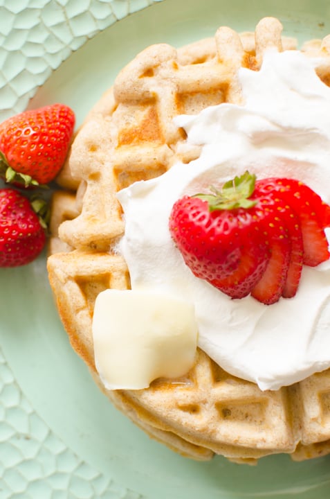 Oatmeal Waffles made fresh for breakfast with oats, cinnamon and several other basic ingredients that you likely have on hand. This oatmeal waffle recipe can be topped with berries, bananas and whipped cream for a delicious and hearty breakfast with lots of nutrition and flavor! 
