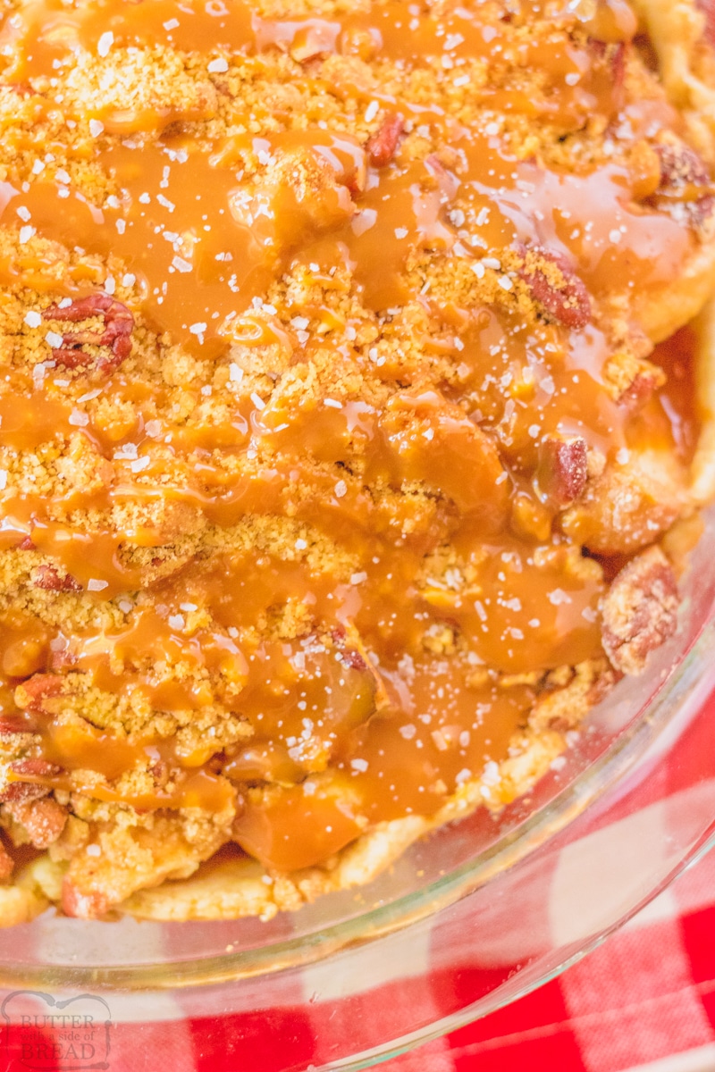close up of a Dutch apple Pie with caramel and pecans