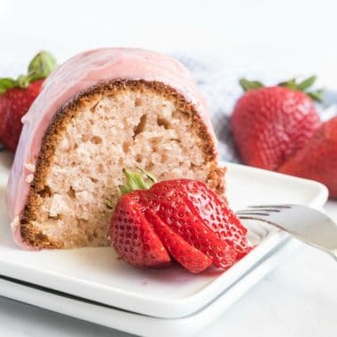 Glazed Strawberry Bundt Cake made with strawberry jam and buttermilk & topped with a sweet, fruity glaze! Easy Homemade Bundt Cake recipe with great strawberry flavor throughout! 