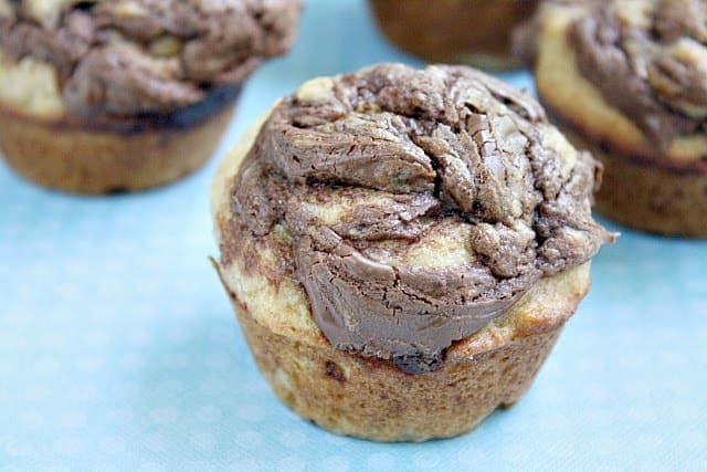 Nutella Banana Muffins give you that delicious "treat" taste with the Nutella, in an amazing homemade banana muffin! Perfect for breakfast, snack or treat! 