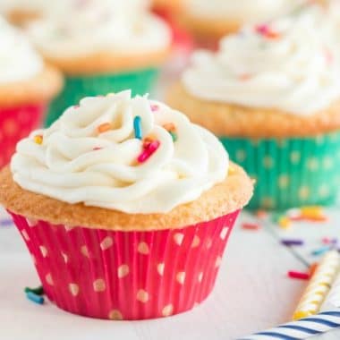 Sugar Cookie Cupcakes are cupcakes that taste just like sugar cookies! The best flavors of two incredible desserts combine in these soft and sweet vanilla frosted cupcakes.