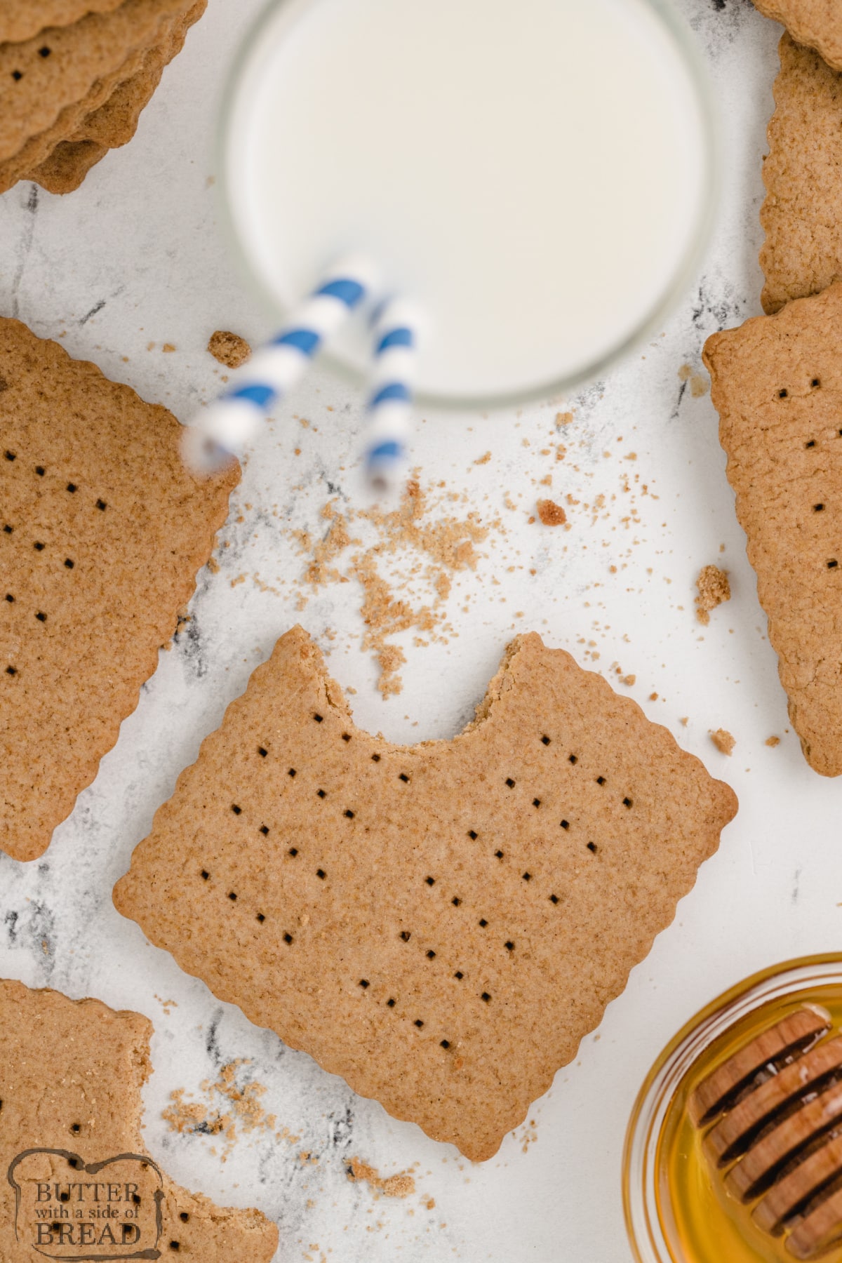 Homemade Graham Crackers are easy to make with a few basic ingredients. These honey graham crackers are made with whole wheat flour and sweetened with honey!