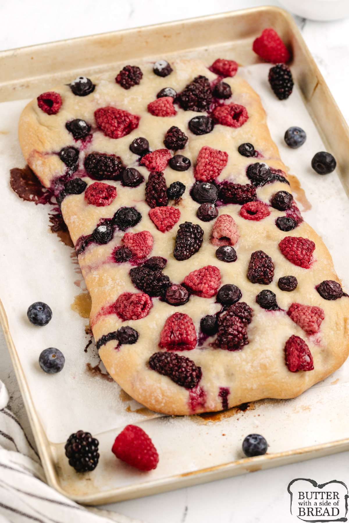 Simple focaccia bread made with fresh berries.