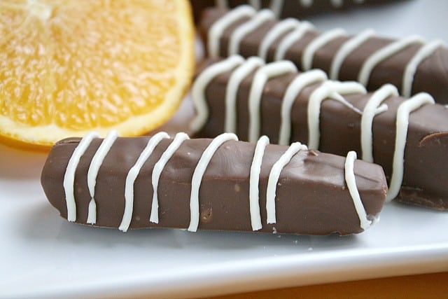 Chocolate Orange Sticks are made with a delicious orange jelly filling dipped in melted chocolate - a favorite holiday candy!