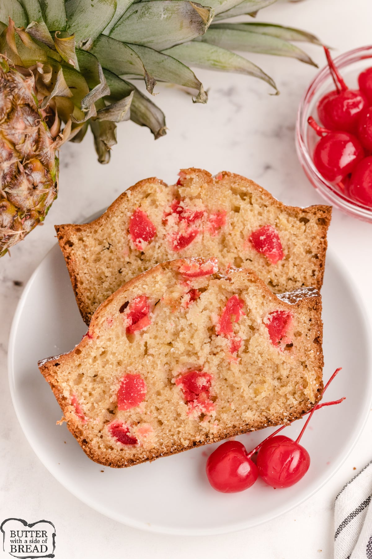Pineapple Cherry Quick Bread made with crushed pineapple and maraschino cherries. Simple quick bread recipe that everyone loves!