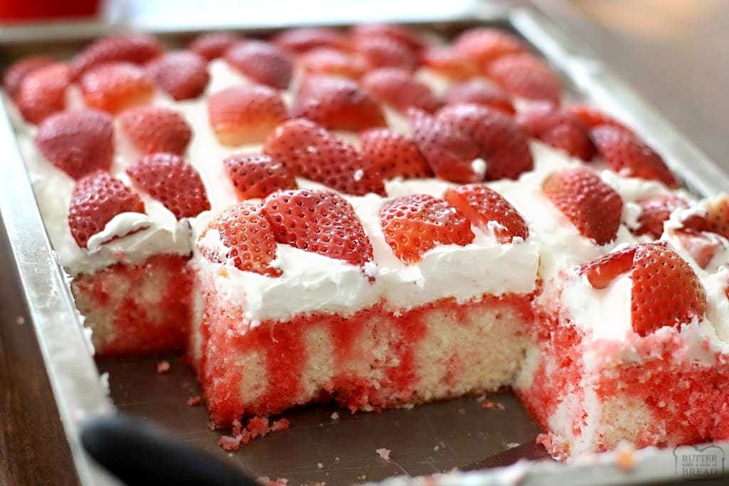 Strawberries & Cream Poke Cake is the perfect light and refreshing dessert for any gathering with family and friends - it is delicious and so pretty!&nbsp;