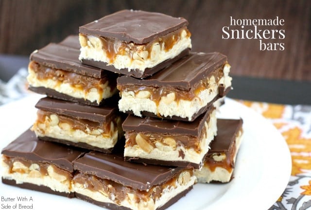 Homemade Snickers Bars made with creamy caramel, easy nougat, peanuts and chocolate. Make a whole pan of your favorite candy bar to share! 