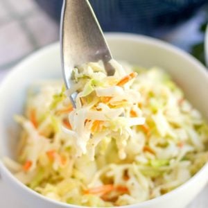 Easy Coleslaw recipe tastes just like KFC's & comes together in minutes! Best ever coleslaw dressing and learn my secret tip that takes your coleslaw from good to GREAT!