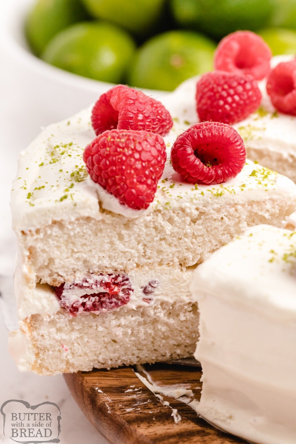 Key Lime Cake made with a cake mix and tons of lime flavor! Add fresh berries and a lime flavored whipped cream for a light, refreshing dessert that looks much fancier than it is!