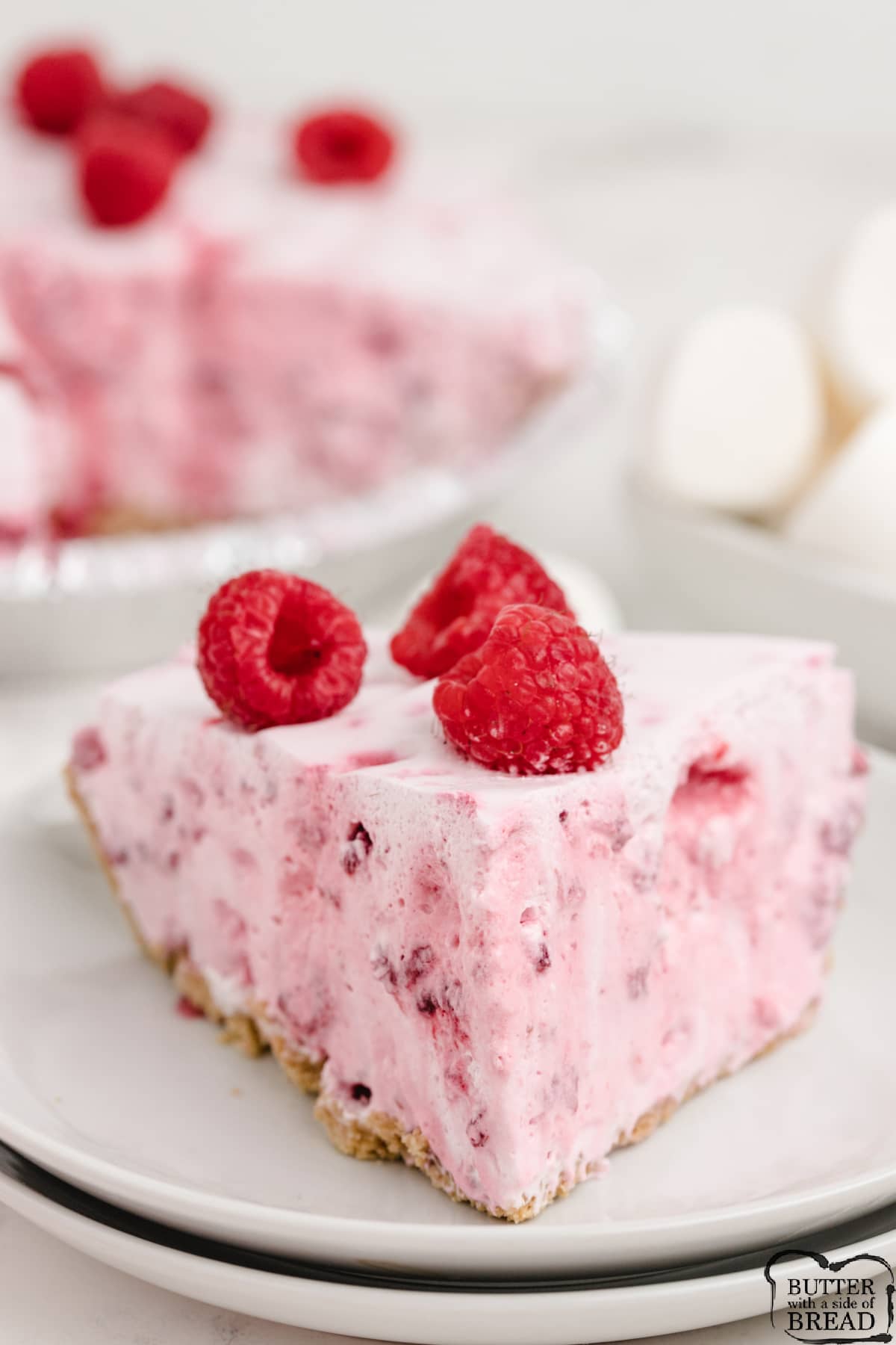 No bake pie made with raspberries and melted marshmallows