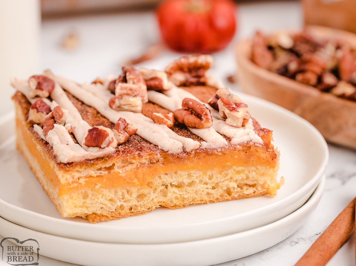 pumpkin cheesecake bar with nuts on top