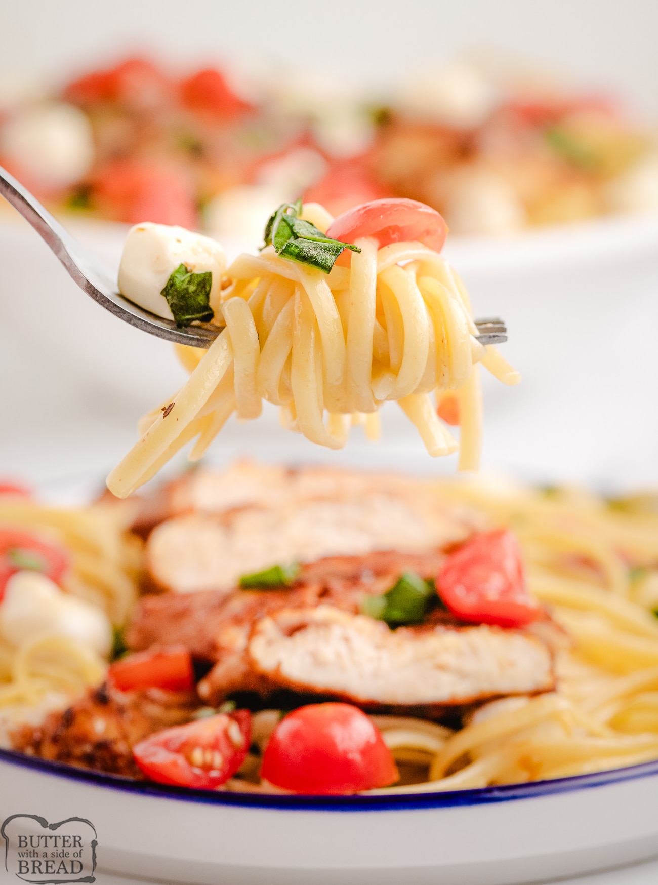forkful of caprese chicken pasta