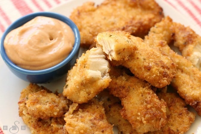 Chicken Strips made from scratch- so tender, juicy & flavorful. Simple tips to take your chicken tenders from good to great! 