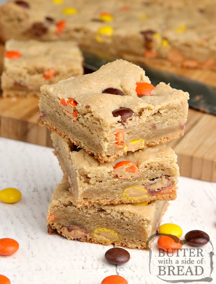 Reese's Peanut Butter Blondies are thick, soft, chewy and full of peanut butter, Reese's Pieces and Reese's Peanut Butter Cups.