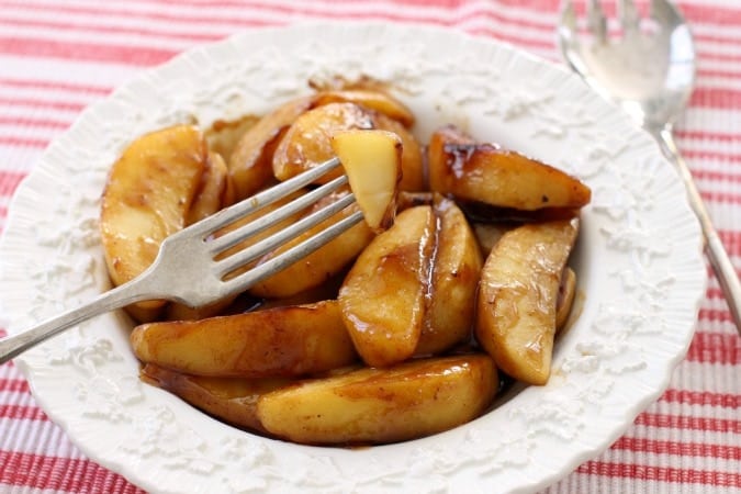 Cinnamon Apples recipe that's simple to make and spiced with cinnamon and nutmeg. Fried in a skillet with butter & brown sugar, they taste incredible.