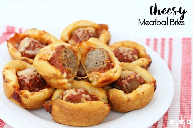 Cheesy Meatball Bites made with crescent dough, meatballs, marinara sauce and lots of cheese! Easy appetizer recipe perfect for parties & game day.