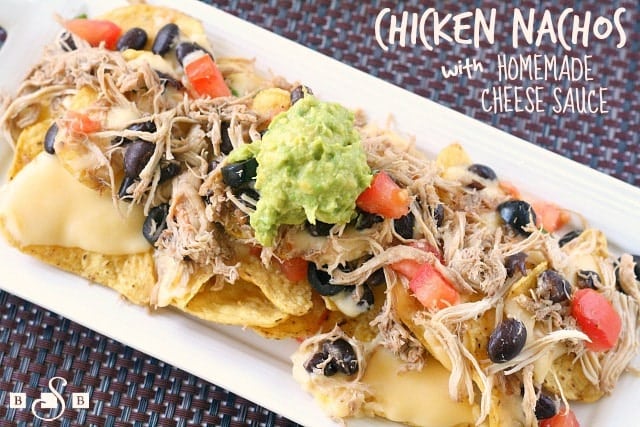 Chicken Nachos with Homemade Cheese Sauce can be completely customized with lots of different toppings to fit everyone's tastes!